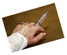 Hand and Syringe